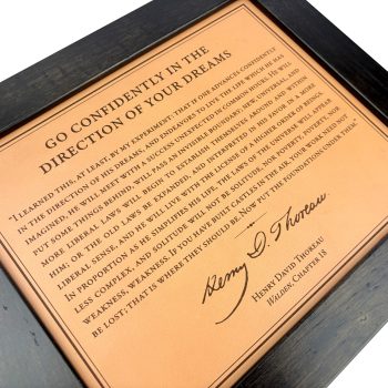"Go Confidently in the direction of your dreams" from Walden in chapter 18 is engraved on leather and framed for a unique literary and motivational gift.