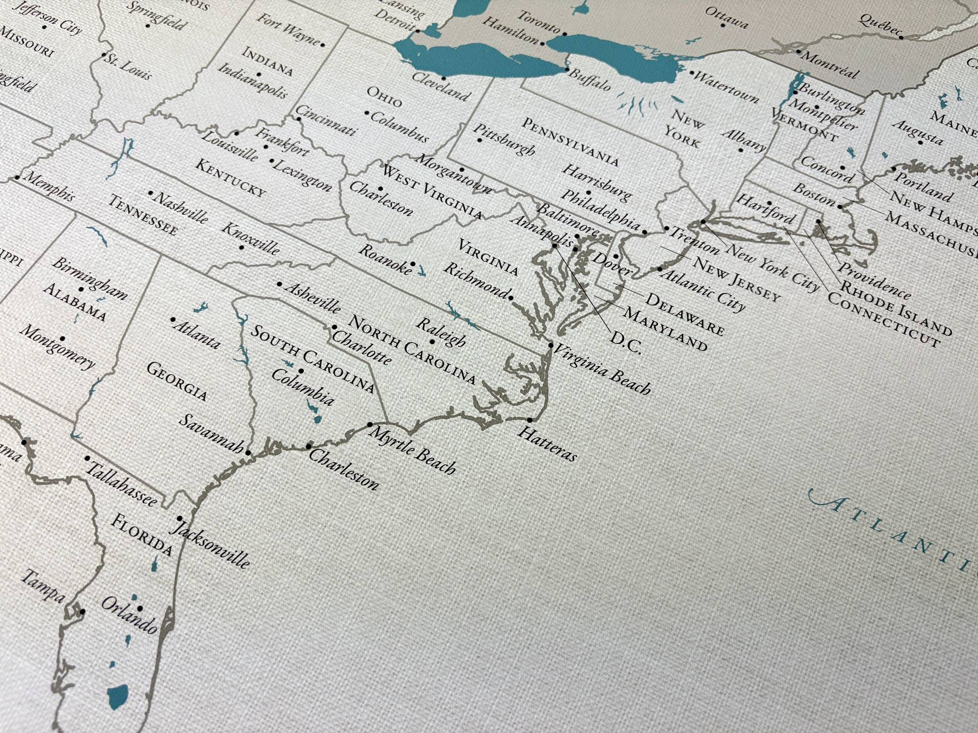 Close-up of 100% cotton canvas USA travel map showing natural fabric texture and detailed professional printing